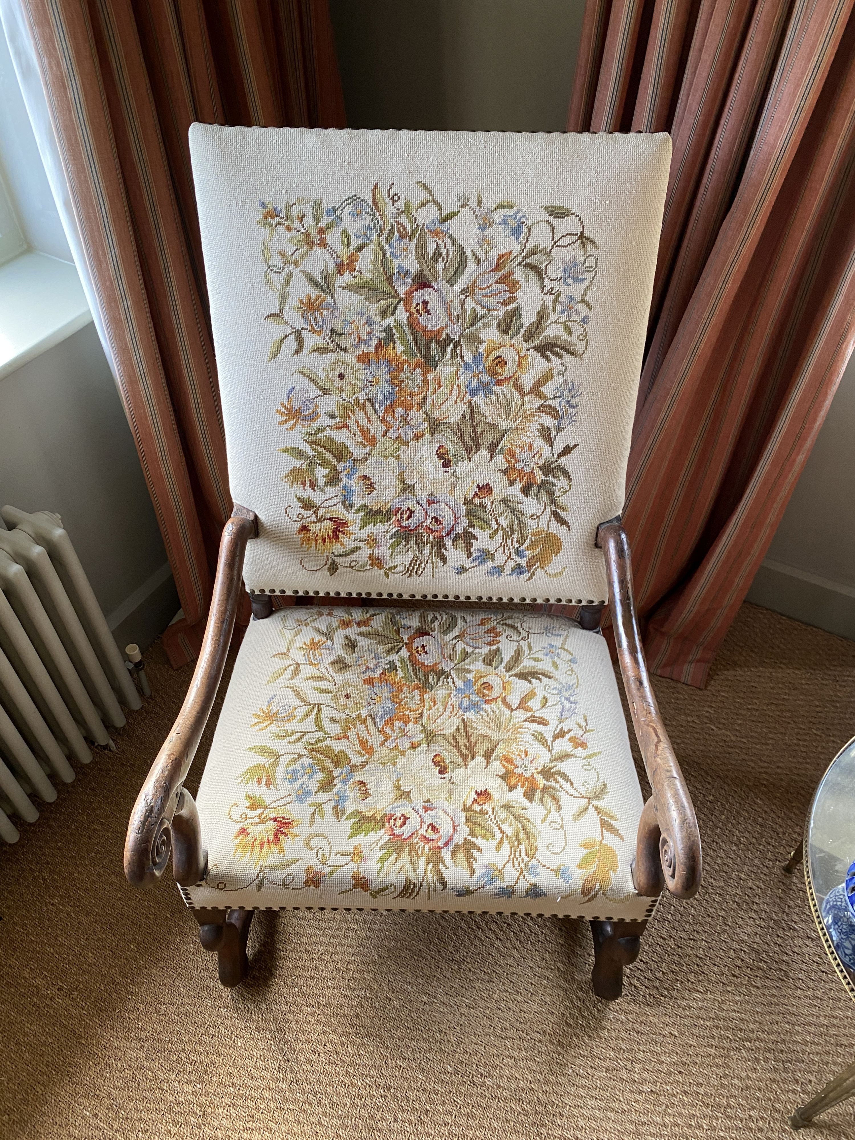 A 19th century French mahogany armchair, with later floral tapestry back and seat, width 65cm height 116cm